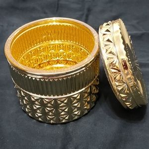 Gold and glass jar